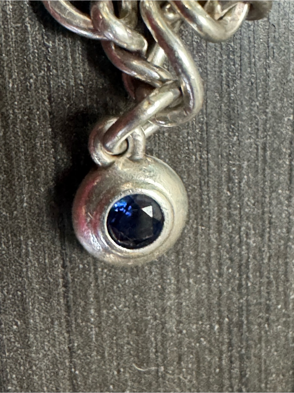 Sterling Silver Charm Necklace with Dark Blue Gem